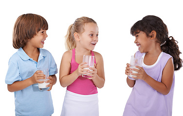 Image showing Milk, mustache and children with drink on face with nutrition, health and funny in white background of studio. Dairy, calcium and kids smile with energy and benefits in diet for teeth and growth