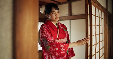 Image showing Japanese, woman and kimono in corridor for tradition, tea ceremony and hallway of Chashitsu room or door. Entrance, person and vintage dress or fashion for temae, ritual and waiting for hospitality