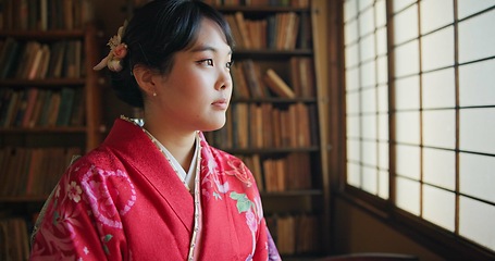 Image showing Japanese, woman and kimono with relax for tradition, tea ceremony and thinking in Chashitsu by window. Thoughtful, person and vintage dress or fashion for temae, ritual and waiting for hospitality