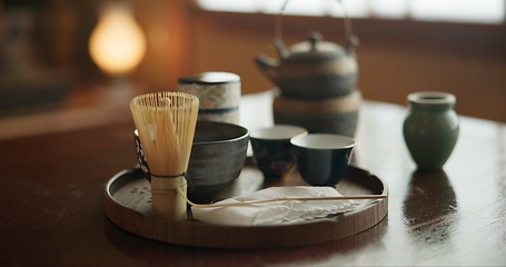 Image showing Tea cup, ceremony and Japanese tradition with matcha and green brew for healing and detox practise. Temae, pot and cut for an indigenous, nutrition and wellness hot drink in a home with healthy herbs