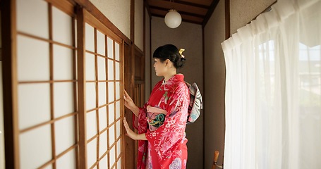 Image showing Japan, woman and kimono in corridor for tradition, tea ceremony and hallway of Chashitsu room or door. Entrance, person and vintage dress or fashion for temae, ritual and waiting for hospitality