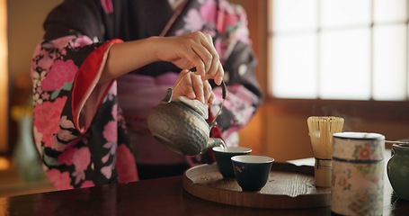 Image showing Japanese, hands and matcha for tea ceremony in Chashitsu room with kimono dress and traditional custom. Person, temae and vintage style outfit for culture, fashion and honor with antique crockery