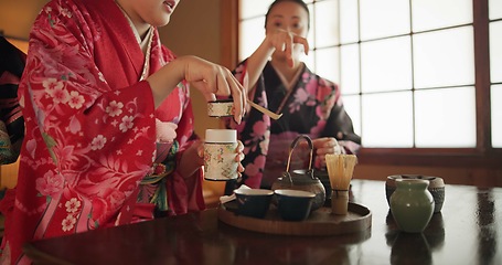 Image showing Japanese, women and kimono for tea ceremony in Chashitsu room with peace or custom tradition. People, temae and vintage style dress or talking with culture, fashion and honor with antique crockery