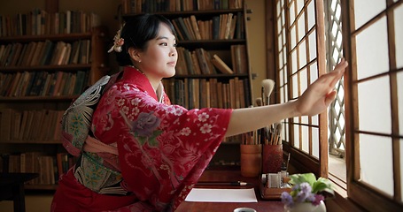 Image showing Open window, Japanese and woman with architecture, apartment and morning with culture. Library, calm and zen with sliding door, female person and traditional dress with accommodation in Tokyo