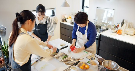 Image showing Japan, women and cooking in kitchen with preparation for food, Japanese cuisine and healthy meal in restaurant. Chef, people and traditional lunch with protein or vegetables for dinner and culture