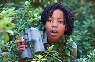 Image showing Nature trees, binocular and child surprise over discovery on adventure, outdoor exploration or bird watching trip. Forest, bush leaves and kid with wow facial expression for search in tropical jungle