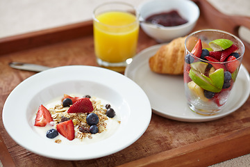 Image showing Food, wellness and closeup of breakfast tray with muesli for balance, benefits or gut health. Fruit, zoom and croissant with vitamins for diet, nutrition or healthy eating, brunch or superfoods salad