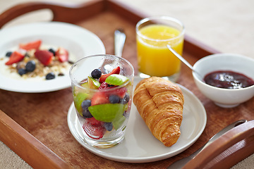 Image showing Wellness, closeup and breakfast food tray with fruit for balance, benefits or gut health. Muesli, zoom and croissant with vitamins for diet, nutrition or healthy eating, brunch or superfoods salad