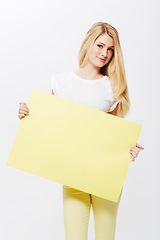 Image showing Woman, portrait and placard or mockup space in studio or poster deal for recommendation, communication or white background. Female person, face and blank paper for news bulletin, message or billboard