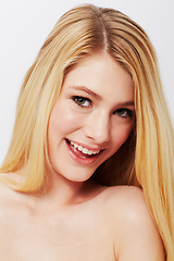 Image showing Portrait, smile and woman with skincare, dermatology and wellness on a white studio background. Face, person and model with beauty and mockup space with shine and glow with soft skin and aesthetic