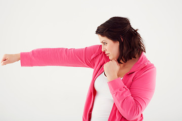 Image showing Woman, profile and boxing with fist in fitness, exercise or workout on a white studio background. Active female person, brunette or fighter in self defense practice, training or punches on mockup