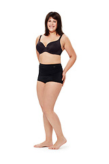 Image showing Portrait, smile and plus size woman in underwear in studio isolated on a white background mockup space. Happy person, model and body positivity, health and natural beauty of confident young girl