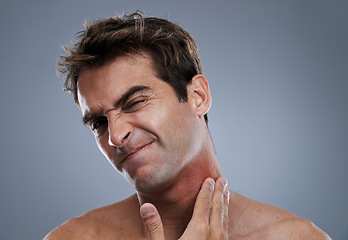 Image showing Man, shave and beard rash from razor burn on grey background for skin care fail, itchy or hair removal. Male person, neck and red pain for healthy wellness or inflammation, studio or mockup space