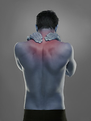 Image showing Back, man and red highlight for neck pain, injury and muscle tension on a grey studio background. Person, guy and model with inflammation and body ache with bruise and broken with strain and burnout