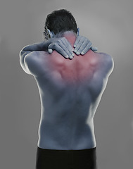 Image showing Back, man and red highlight for neck pain, burnout and muscle tension on a grey studio background. Person, sore and model with inflammation and body ache with bruise and broken with strain and injury