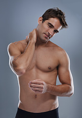Image showing Neck pain, studio and man with injury problem, medical emergency and massage muscle pressure. Inflammation, fibromyalgia or sore person with nerve tension, accident or hurt anatomy on grey background