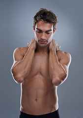 Image showing Thinking, skincare and man with cosmetics, shirtless and dermatology on a grey studio background. Person, thoughts and model with wellness and muscular with health and grooming with shine or body