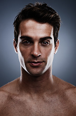 Image showing Portrait, skincare and man with cosmetics, wellness and grooming on grey studio background. Person, guy and model with routine or treatment with luxury and shine with beauty, glowing or dermatology