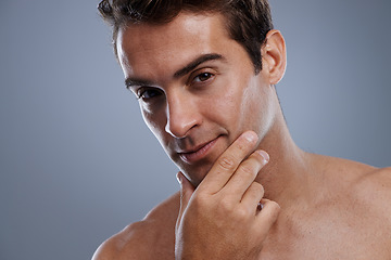 Image showing Portrait, shaving and man with skincare, cosmetics and dermatology on grey studio background. Face, person or model with grooming routine or healthy skin with treatment, shine or confident with glow