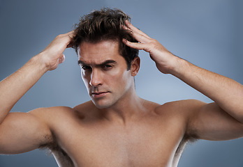 Image showing Man, portrait and hairstyle with confidence in studio on grey background for wellness hygiene, application or grooming. Male person, face and healthy self care for morning routine, model or mockup