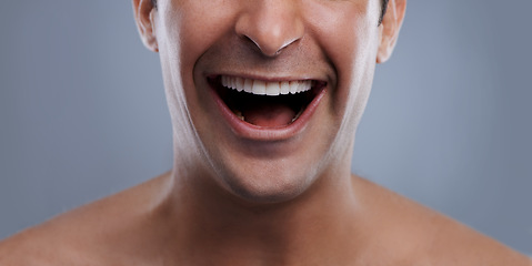 Image showing Man, mouth and laughing with skincare and lips with hygiene, jawline and satisfaction with treatment closeup. Grooming, confidence and face with male model in studio background for cosmetic shave