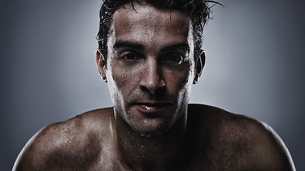 Image showing Portrait, man and water with cosmetics, sweating and dermatology on grey studio background. Face, person and model with hydration and beauty with morning routine, wet and hygiene with skincare