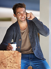 Image showing Phone call, smile and young man with coffee for deal, partnership or work communication in office. Happy, talking and male person on mobile conversation with cellphone and cappuccino in workplace.