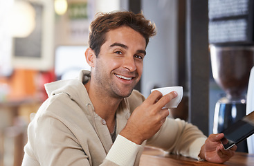 Image showing Happy, coffee and portrait of man in a cafe with tablet for networking on social media or internet. Smile, cappuccino and young male person with digital technology for research in restaurant.