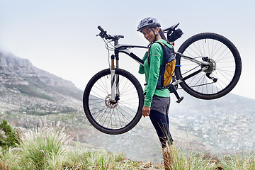 Image showing Woman, carry mountain bike and smile in portrait with pride, fitness and view of cityscape from hill. Girl, person and happy with bicycle on adventure, training or exercise for wellness in Cape Town