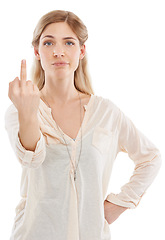 Image showing Angry, portrait or woman with middle finger in studio for attitude, feedback or opinion on white background. Frustrated, rude or lady model face with hate, hand or emoji, sign or reaction to conflict