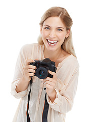 Image showing Portrait, photographer and excited woman with camera in studio isolated on a white background. Funny face, paparazzi and technology for hobby, taking pictures and creative professional photoshoot