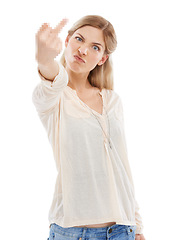 Image showing Frustrated, portrait or woman with middle finger in studio for attitude, feedback or opinion on white background. Angry, rude or lady model face with hate, hand or emoji, sign or reaction to conflict