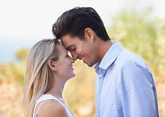 Image showing Love, forehead touch and face of happy couple with romantic care, trust and smile for weekend getaway in nature. Relax, wellness and outdoor people bonding, sweet and connect on Australia vacation