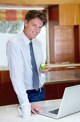 Image showing Laptop, apple and portrait of business man in home for morning routine, kitchen and healthy breakfast. Professional, worker and person on computer for website, research and internet with fruit