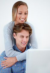 Image showing Laptop, hug and couple on internet, online website and social networking at home. Happy, dating and email with man and woman on computer for relaxing, streaming subscription and remote work together