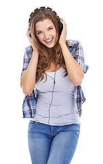 Image showing Portrait, smile and headphones for music with woman in studio isolated on white background for sound. Radio, audio or podcast and happy young person listening to song with streaming subscription