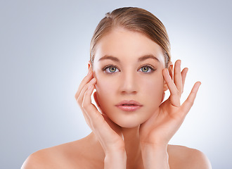 Image showing Portrait. skincare and woman with cosmetics, shine and glow on a white studio background. Face, person and model with self care and grooming with healthy skin, beauty and treatment with dermatology