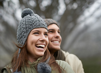 Image showing Couple, forest and happy on hiking vacation in outdoors, love and bonding in relationship for connection. People, journey and travel for exploring adventure, park and security in marriage on mountain