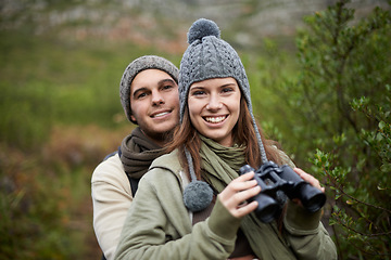 Image showing Hiking portrait, binocular and couple smile for nature getaway, weekend break and camping retreat in eco forest. Sustainable woods, love and people bond on travel adventure, trekking or bird watching