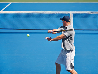 Image showing Sport, man and tennis on court with training, competition and performance outdoor with fitness and energy. Athlete, player and ball on turf for serve, exercise and racket with skill, game and hobby