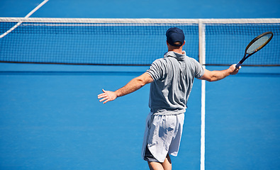 Image showing Sport, man and tennis on court with workout, competition and performance outdoor with fitness and energy. Athlete, player and match on turf for training, exercise and racket with skill, game or hobby