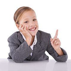 Image showing Child, portrait and business career in suit for future professional dreams, white background or studio. Kid, girl and finger for grownup idea as worker in corporate company, dress up or mockup space