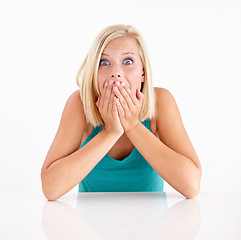 Image showing Woman, gossip and cover mouth in portrait with surprise, secret and announcement in studio on white background. Wow, shocked and girl with hands on face for crazy fake news, drama or story of mistake