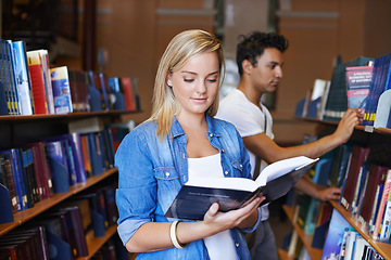 Image showing Reading, book or woman in a library to search at university, college or school campus for education. Bookshelf, learning or smart student with scholarship studying knowledge, research or information