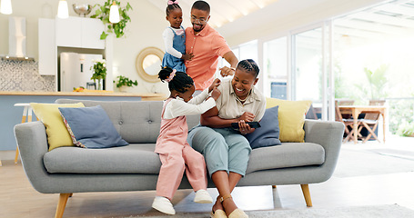 Image showing Happiness, playful parents and kids on sofa, black family having fun and smile in home together. Mother, father and young children playing on couch in living room, happy playing with love and support