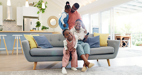 Image showing Happiness, playful parents and kids on sofa, black family having fun and smile in home together. Mother, father and young children playing on couch in living room, happy playing with love and support