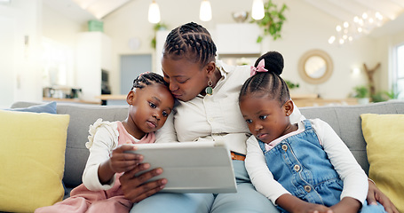 Image showing Happy, mother with her child and tablet on sofa in living room of their home together. Technology or connectivity, happiness or kissing and black family on couch streaming a movie in their house