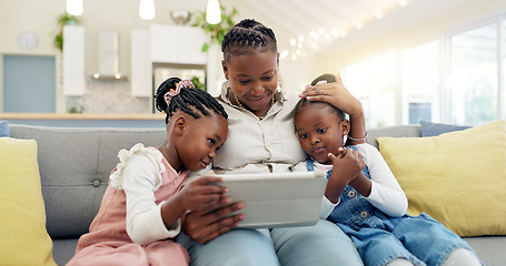 Image showing Happy, mother with her child and tablet on sofa in living room of their home together. Technology or connectivity, happiness or kissing and black family on couch streaming a movie in their house