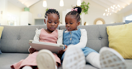 Image showing Black girl children, tablet on sofa and online with elearning or watching cartoon movie, sisters at home and screen time. Young female kids, streaming and subscription to education app or film