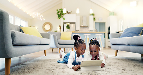 Image showing Black girl children on ground with tablet and relax, elearning or watch cartoon movie, sisters at home and screen time. Young female kids, streaming online and subscription to education app or film